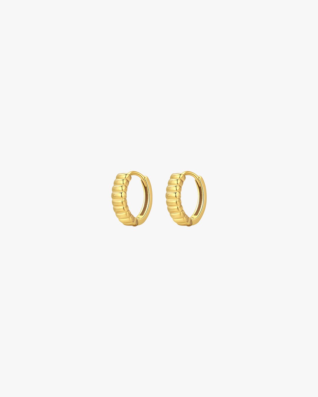 Gold hoop earrings with ribbed texture on white background, minimalist jewelry, fashion accessories, elegant design, women's gold earrings.
