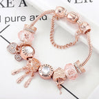 Rose-Tone Charm Bracelet with Beads and Dangling Accents