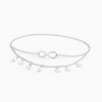 Silver infinity anklet with star and pearl charms, double chain design, elegant jewelry accessory, perfect for fashion-forward styling.