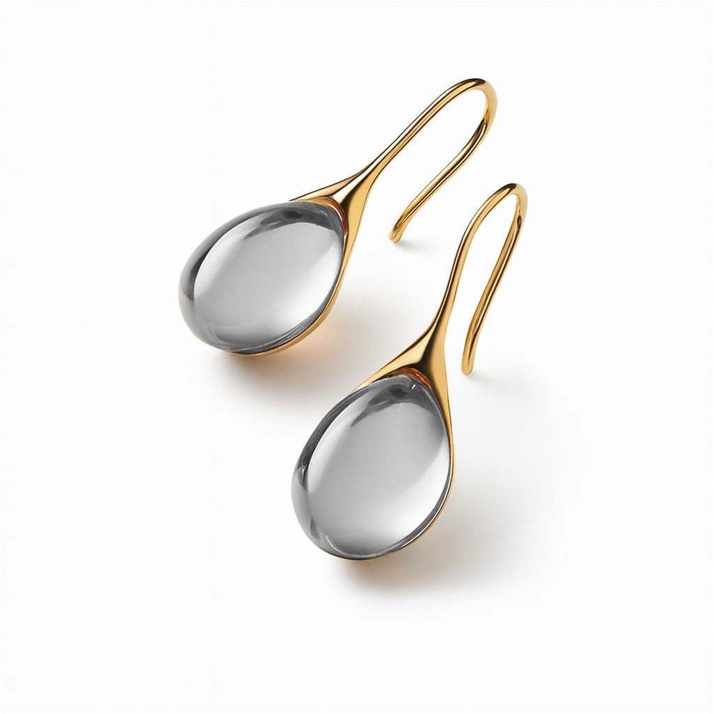 Gold and silver teardrop earrings with hook design, elegant jewelry accessory, modern fashion statement, reflective metallic finish.