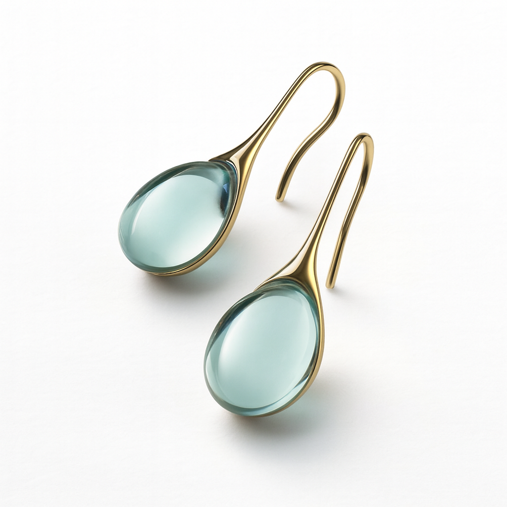 Elegant gold drop earrings with translucent blue gemstones, minimalist design, luxury jewelry, fashion accessories, perfect for formal occasions.