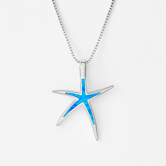 Silver starfish pendant necklace with blue opal inlay on a box chain, elegant ocean-inspired jewelry, perfect for beach-themed fashion.