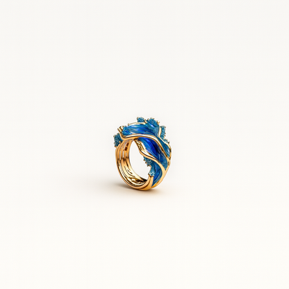 Elegant gold ring with vibrant blue enamel wave design and sparkling gemstones, luxury jewelry, unique artistic craftsmanship, fashion accessory.