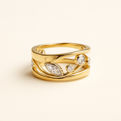 Gold ring with diamond accents on a light beige background