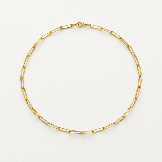Gold paperclip chain necklace on white background, minimalist jewelry, elegant fashion accessory, women's trendy gold necklace, modern design.