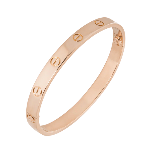 Gold Cartier Love Bracelet with screw motif, luxury jewelry, iconic design, elegant bangle, high-end fashion accessory, timeless style.