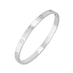Silver Cartier Love Bracelet with screw motif, luxury jewelry, iconic unisex design, high-end fashion accessory, elegant wristwear.