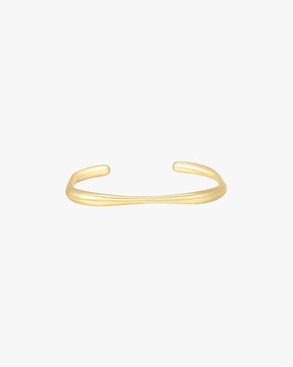 Gold bracelet on a white background