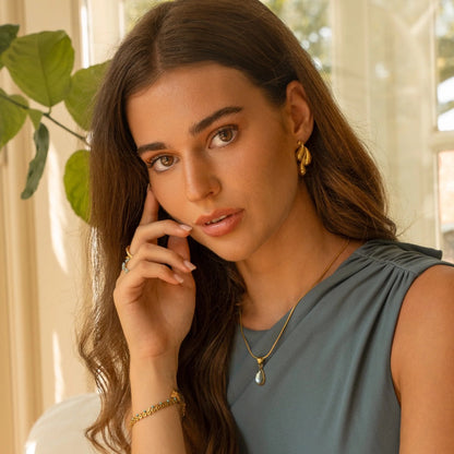 Gold Plated Raindrop Stud Earrings – Elegant Teardrop Design Earrings for Women