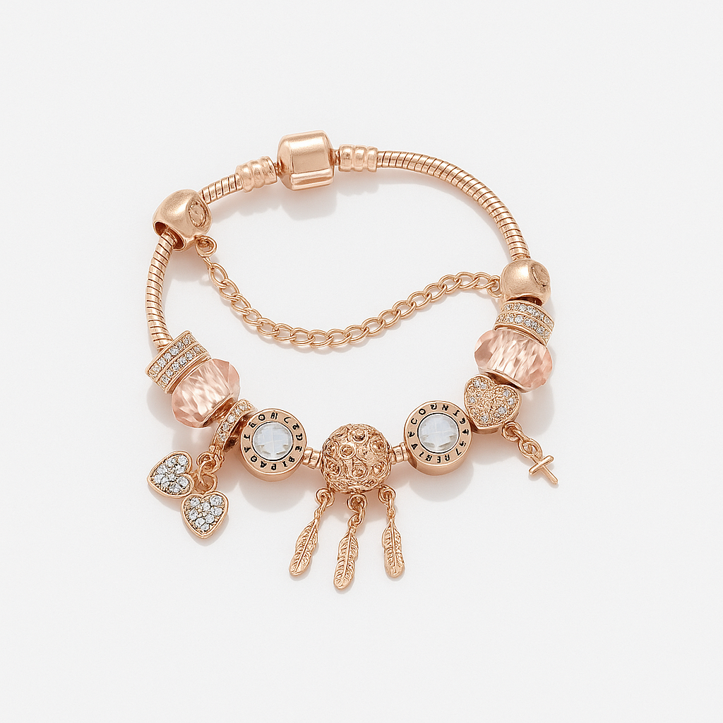 Rose gold bracelet with various charms on a light background