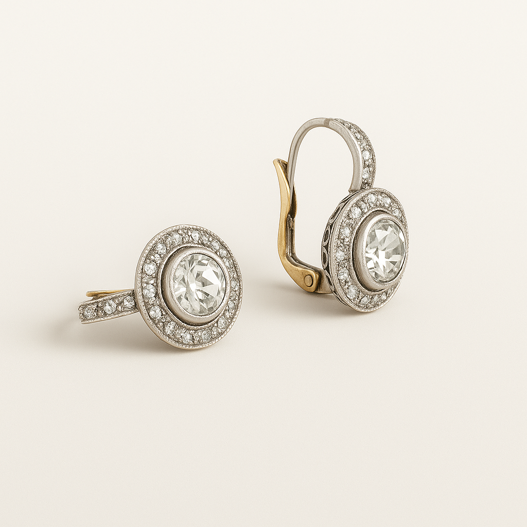 Pair of diamond earrings on a light beige background