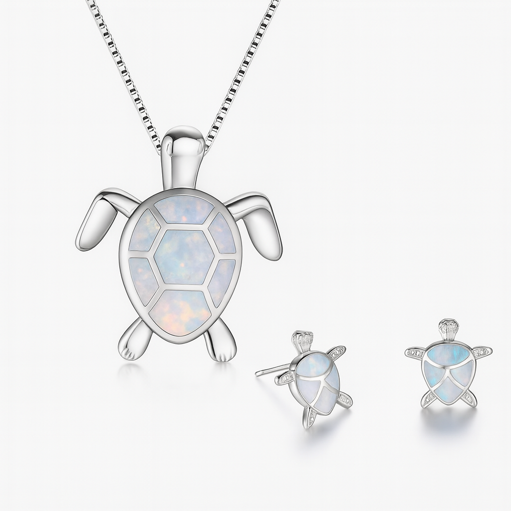 Silver turtle jewelry set with opal inlay, featuring a necklace and matching earrings. Elegant ocean-themed accessories for women.