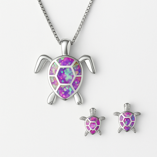 Silver turtle jewelry set with vibrant purple and green opal inlay, featuring a necklace and matching earrings on a white background.