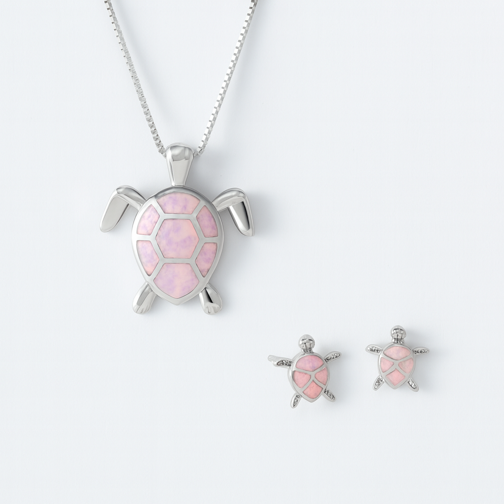 Silver turtle jewelry set with pink opal inlay, featuring a necklace and matching earrings. Elegant ocean-themed accessories for women.