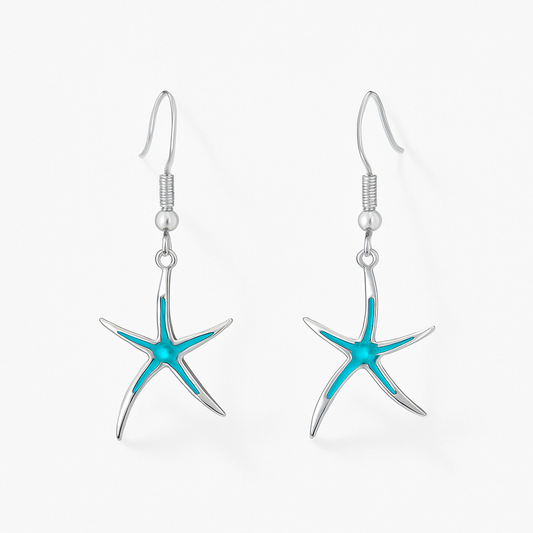 Silver starfish earrings with turquoise enamel accents, featuring hook closures. Perfect for beach-themed fashion and ocean-inspired jewelry lovers.