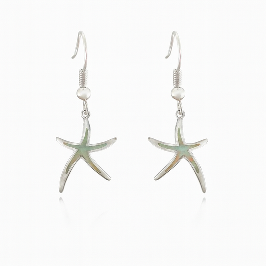 Silver starfish dangle earrings with hook closure, reflecting light. Perfect for beach-themed fashion, ocean-inspired jewelry, or summer accessories.