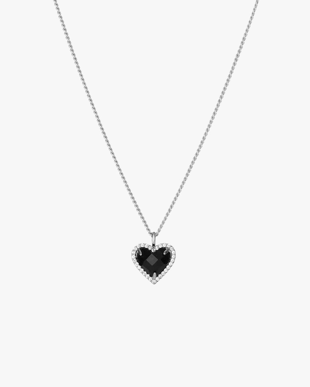 Heart-shaped black gemstone pendant necklace with diamond accents on a silver chain, elegant jewelry piece, perfect for special occasions.