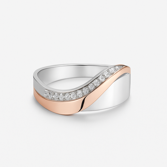 Elegant two-tone gold and silver wave ring with sparkling diamonds, modern design, luxury jewelry, perfect for weddings or special occasions.