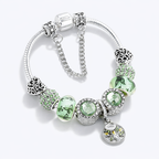 Sterling Silver Bracelet with Green Beads and Tree Charm