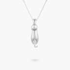 Silver cat pendant necklace on a delicate chain, minimalist feline jewelry design, perfect for cat lovers and fashion enthusiasts.