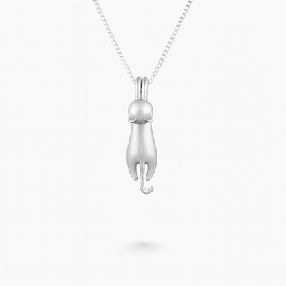 Silver cat pendant necklace on a delicate chain, minimalist feline jewelry design, perfect for cat lovers and fashion enthusiasts.