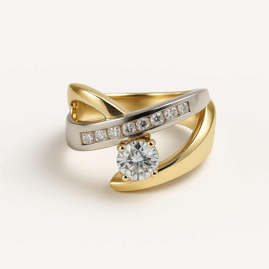 Two gold and diamond rings on a light background