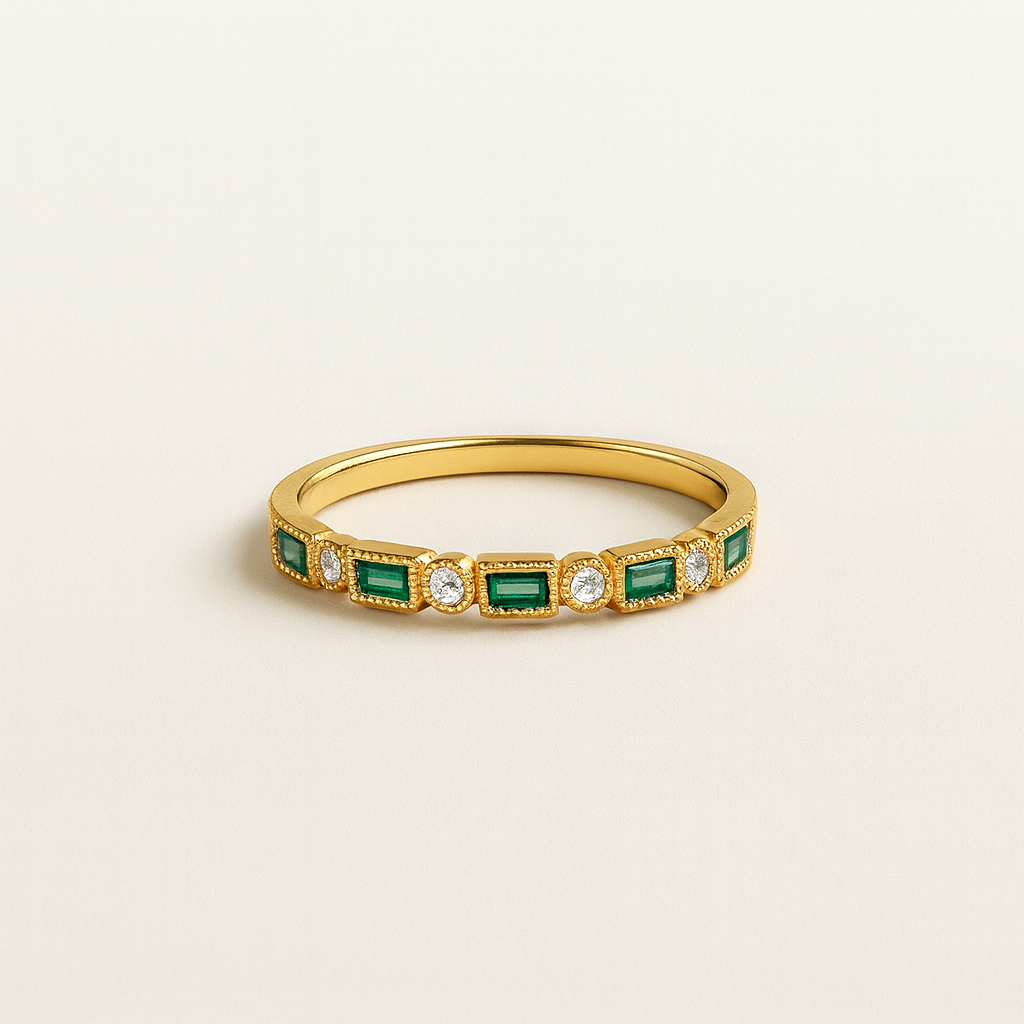 Gold ring with emeralds and diamonds on a beige background