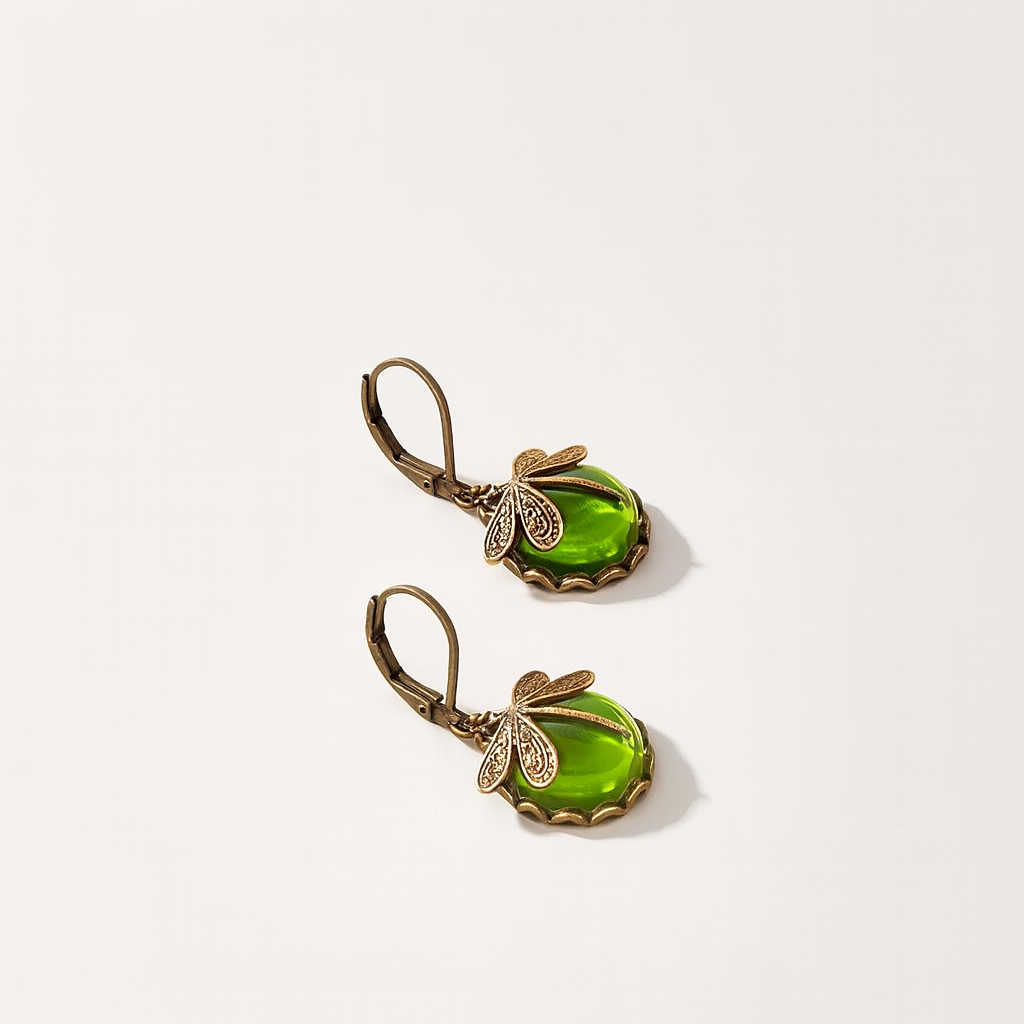 Vintage-style earrings with green gemstone and intricate dragonfly design, set in antique bronze. Elegant jewelry for women, perfect for gifts.