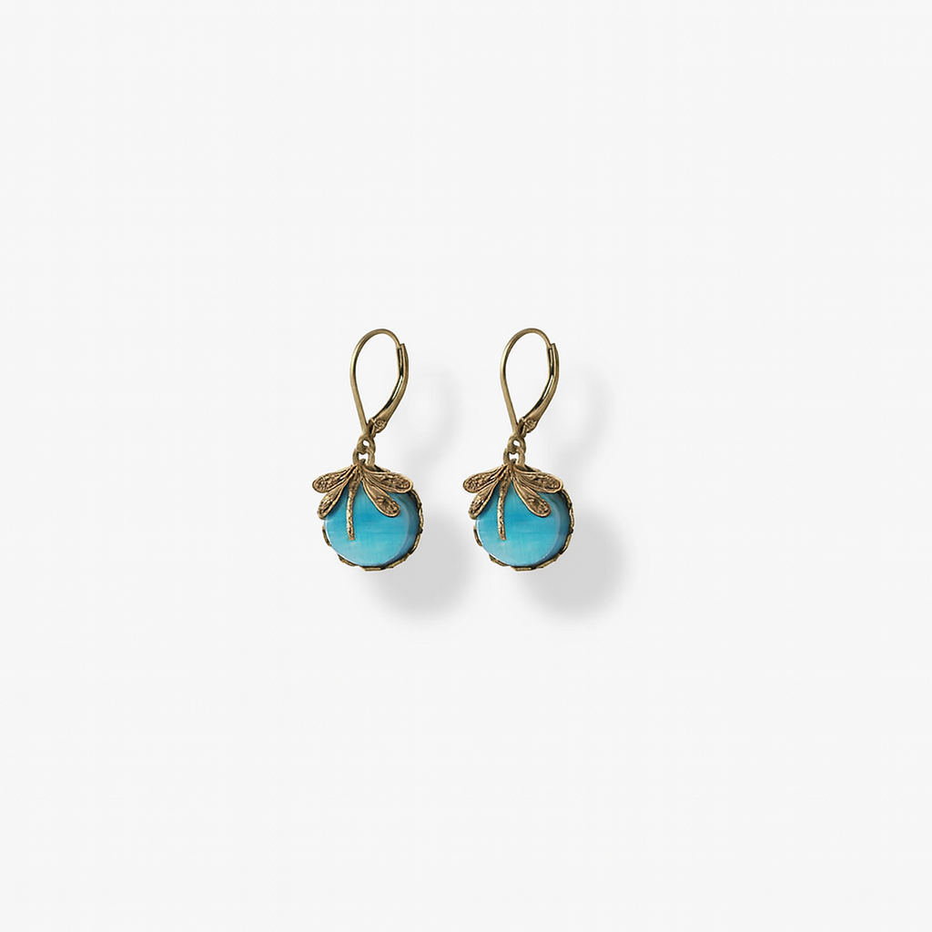Vintage-style turquoise drop earrings with intricate gold detailing, featuring leverback clasps. Elegant jewelry accessory for women.