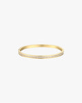Gold bangle bracelet with diamond accents, elegant jewelry piece, minimalist design, perfect for fashion accessories, women's luxury wristwear.