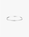 Silver bangle bracelet with a sleek design and subtle diamond accents, perfect for elegant fashion accessories and jewelry collections.