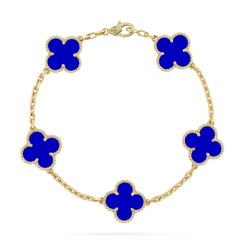 Gold chain bracelet with five blue clover-shaped charms, featuring diamond accents. Elegant jewelry piece, luxury fashion accessory.