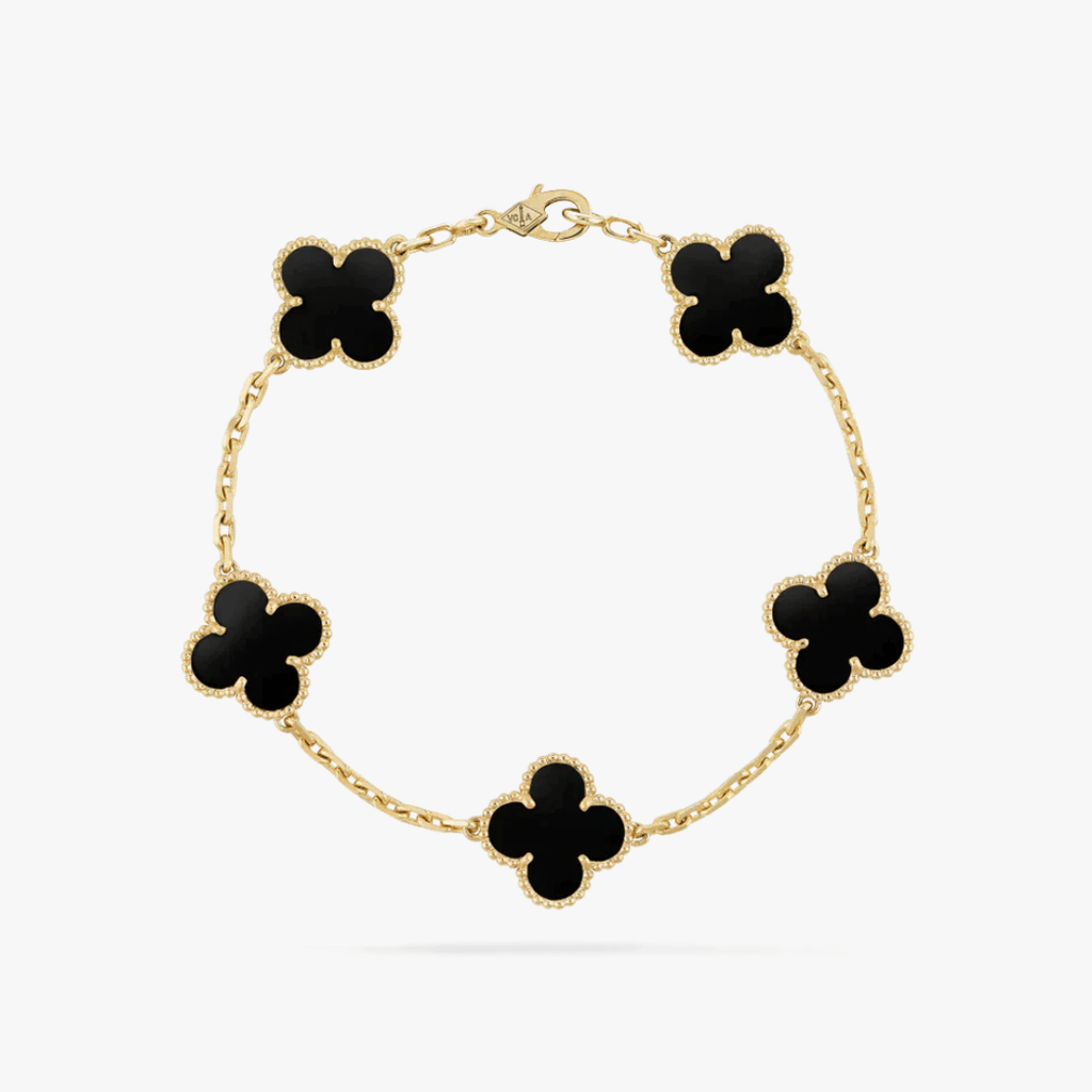Gold bracelet with five black clover-shaped charms, elegant chain design, luxury jewelry, fashion accessory, Van Cleef & Arpels style.