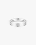 Silver band ring with three embedded round diamonds on a white background. Elegant jewelry, luxury accessory, diamond ring.