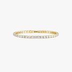Gold tennis bracelet with round-cut diamonds, elegant jewelry piece, luxury accessory, sparkling gemstones, perfect for special occasions and gifts.