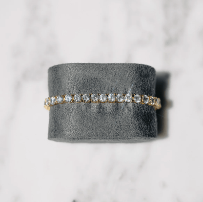 Gold Tennis Bracelet with Round-Cut Clear Stones