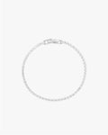 Elegant diamond tennis bracelet with a secure clasp, featuring sparkling round-cut diamonds set in a sleek, minimalist design. Perfect luxury jewelry.