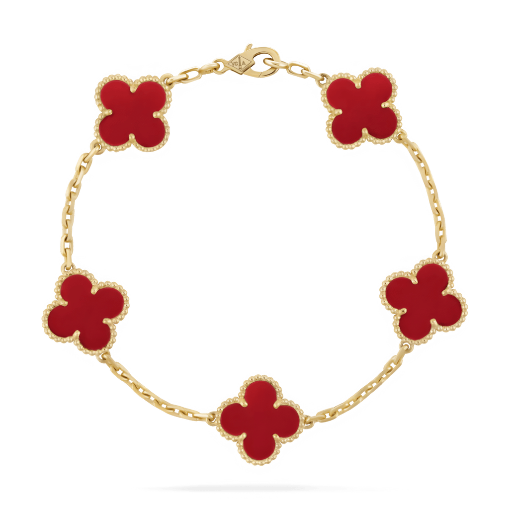 Gold bracelet with five red clover-shaped charms, luxury jewelry, elegant design, Van Cleef & Arpels style, fashion accessory, high-end craftsmanship.