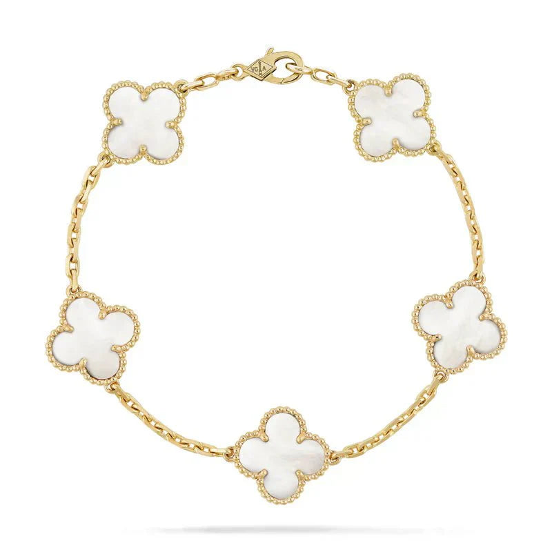 Gold chain bracelet with six white clover-shaped charms, featuring diamond accents. Elegant jewelry piece, luxury fashion accessory.