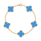 Gold bracelet with five blue clover-shaped charms, luxury jewelry, elegant design, fashion accessory, high-end style, women's bracelet.