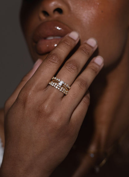 Gold Ring with Graduated Round Stones