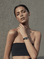 Sculpted Dial Black Leather Quartz Watch – Modern Art Inspired Women’s Timepiece