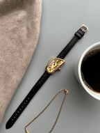 Gold Oval Case Watch with Black Leather Strap – Quartz Movement