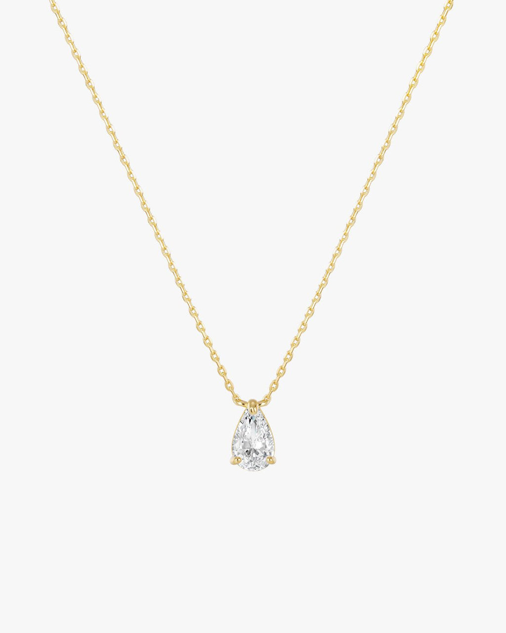 Gold chain necklace with a pear-shaped diamond pendant, minimalist jewelry design, elegant and timeless accessory for fashion and style enthusiasts.