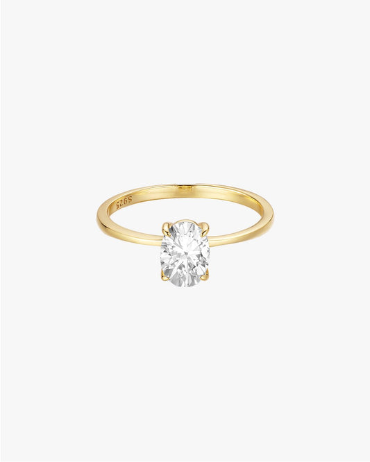 Gold Ring with Oval-Cut Center Stone