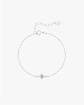 Delicate silver chain bracelet with a central star-shaped charm, adjustable clasp, and heart tag. Perfect for elegant jewelry lovers.