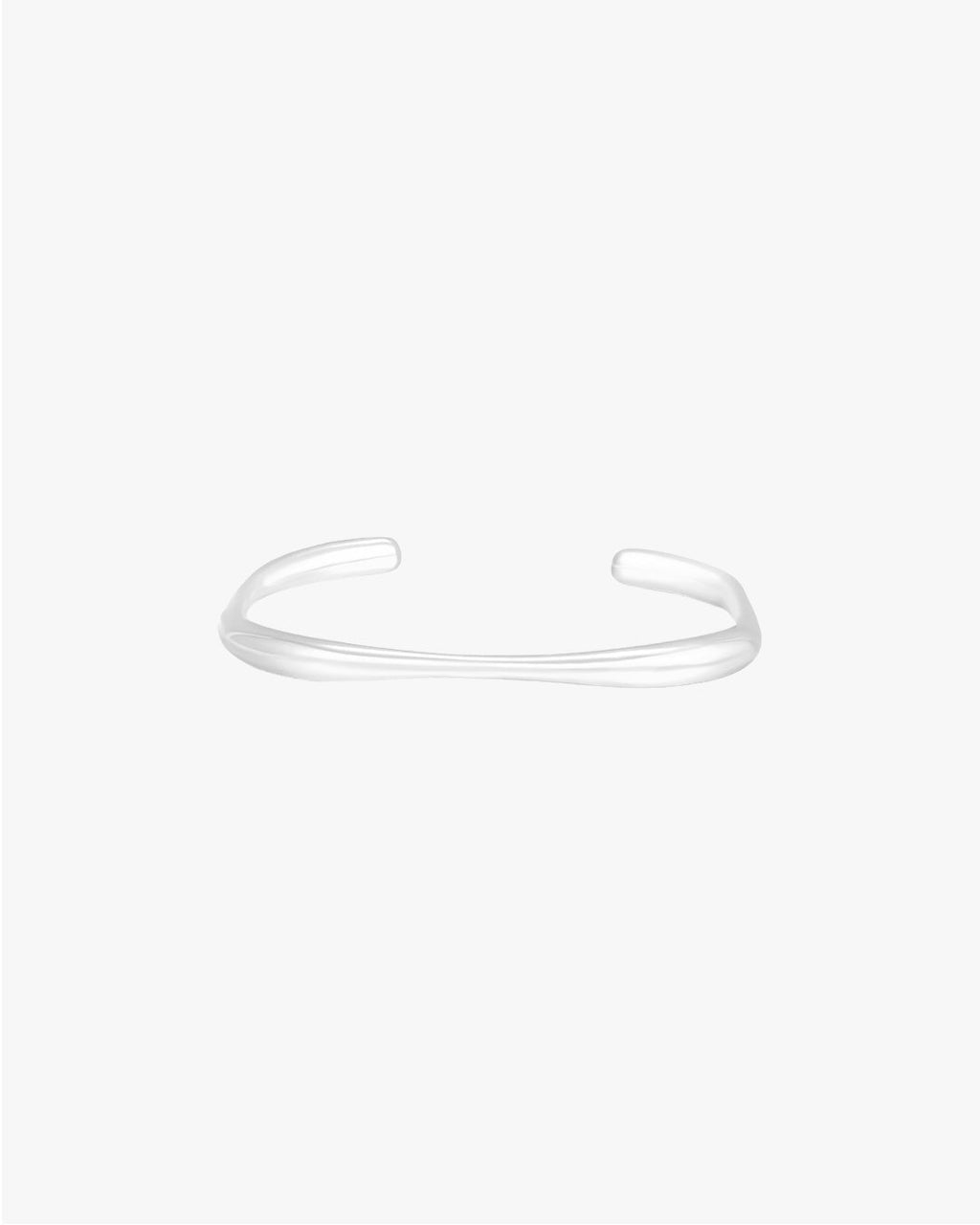 Minimalist silver cuff bracelet on white background, sleek and modern design, unisex jewelry accessory, perfect for fashion-forward style.