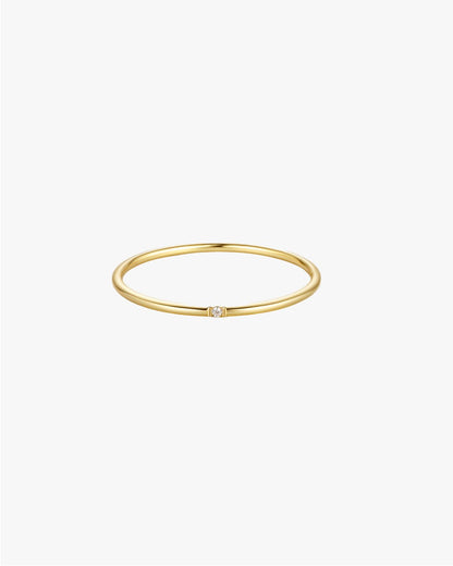 Delicate Gold Ring with Miniature Center Stone