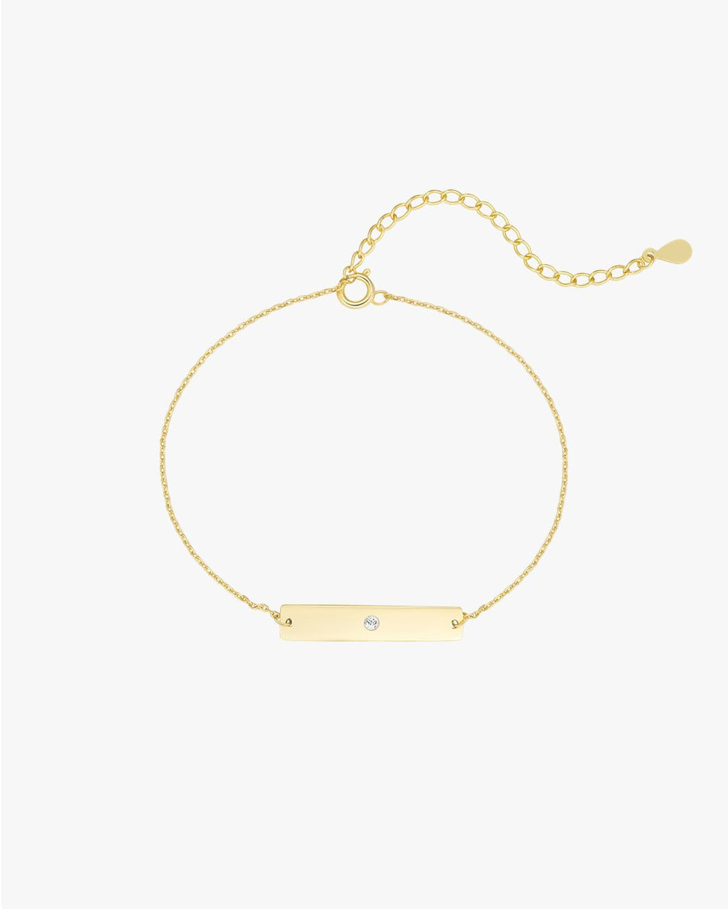 Gold chain bracelet with a rectangular bar featuring a single diamond, adjustable link chain, minimalist jewelry, elegant accessory for women.