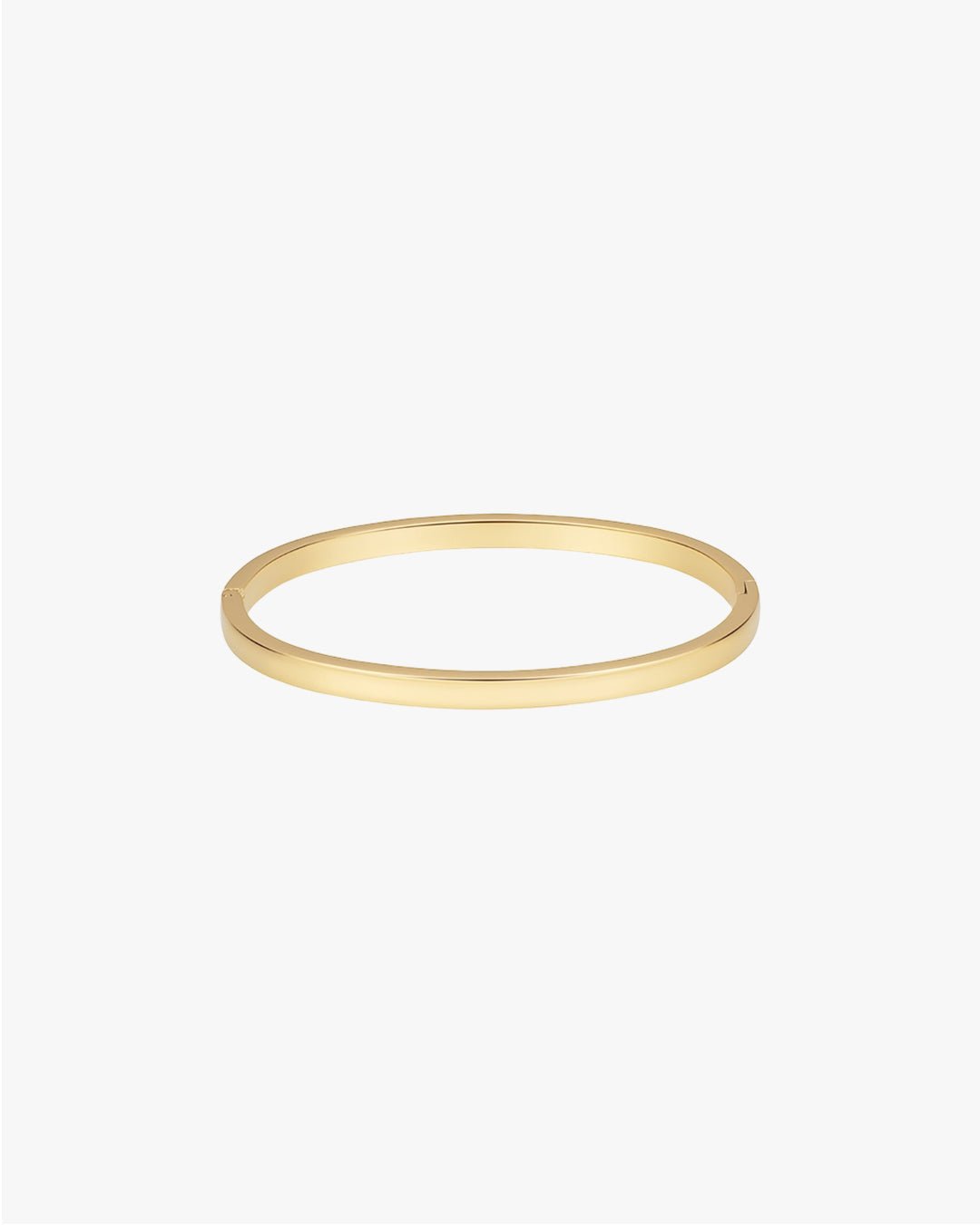 Gold bangle bracelet on white background, minimalist jewelry design, sleek and elegant accessory, perfect for fashion-forward style enthusiasts.